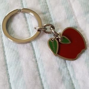 Coach enamel apple key fob.